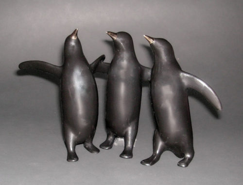 Penguin Trio Sculpture 474 by Loet Vanderveen shown in the black patina.